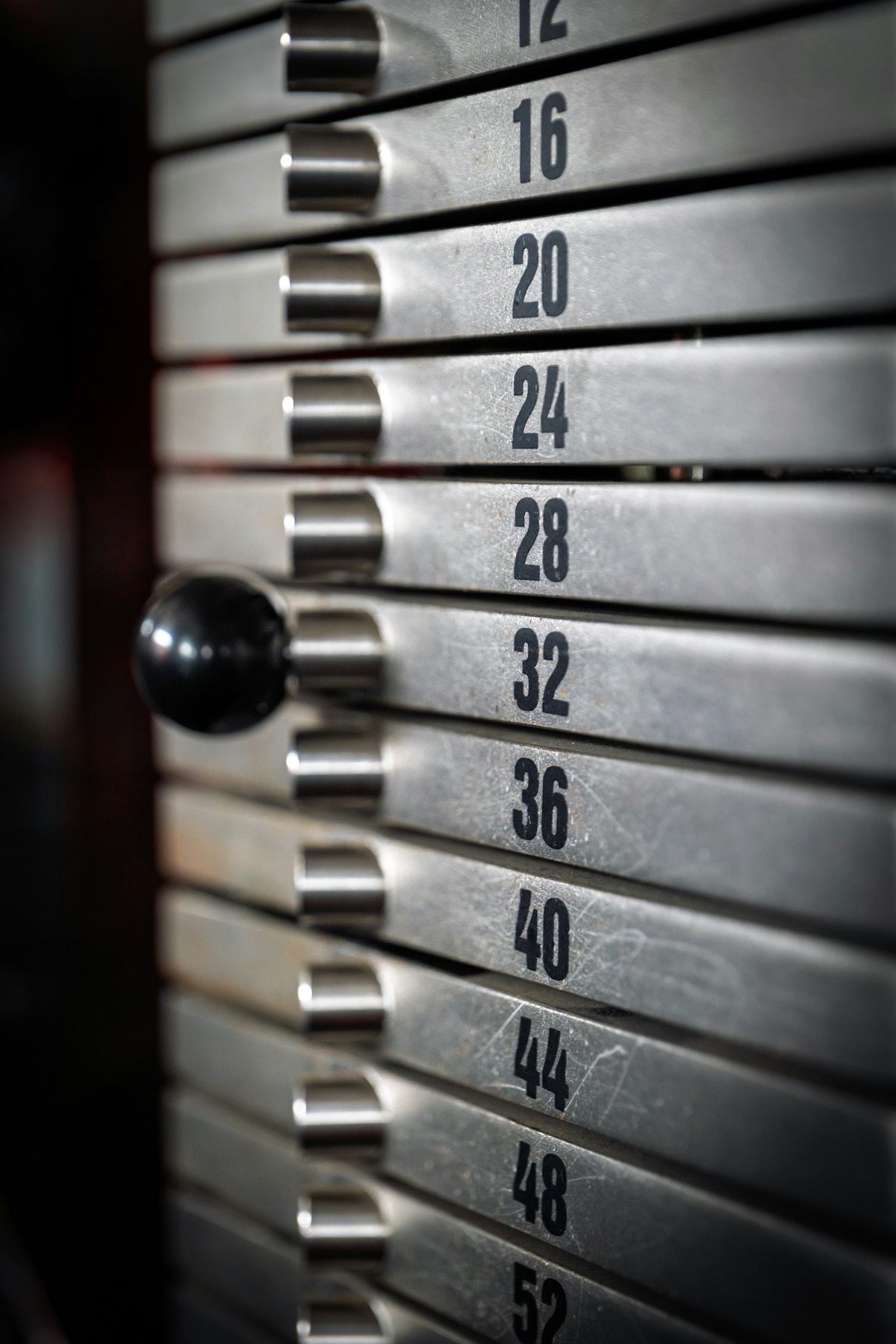 A selector pin set in a weight stack at the 32 plate
